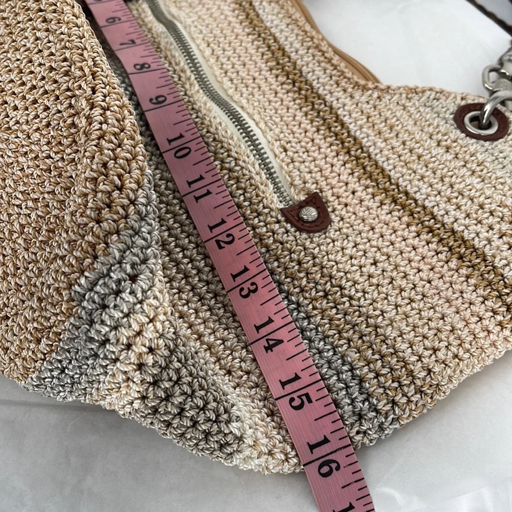 The Sak Woven Straw Hobo in Beige, Tan, Brown